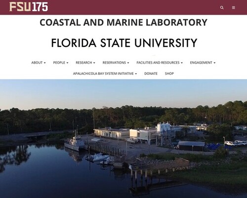Florida State University Coastal and Marine Laboratory website: an aerial view of the lab's waterfront buildings and research boats at the dock